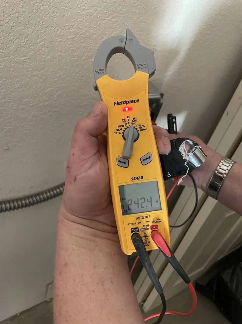 Voltage testing with clamp meter during Outlet Installation in Margate